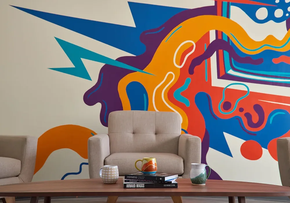 The mural behind the sofa.